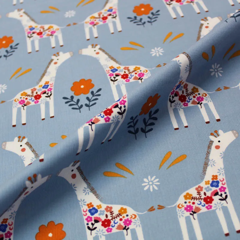 Dressmaking Corduroy - Pale Blue - Kissing Giraffes
