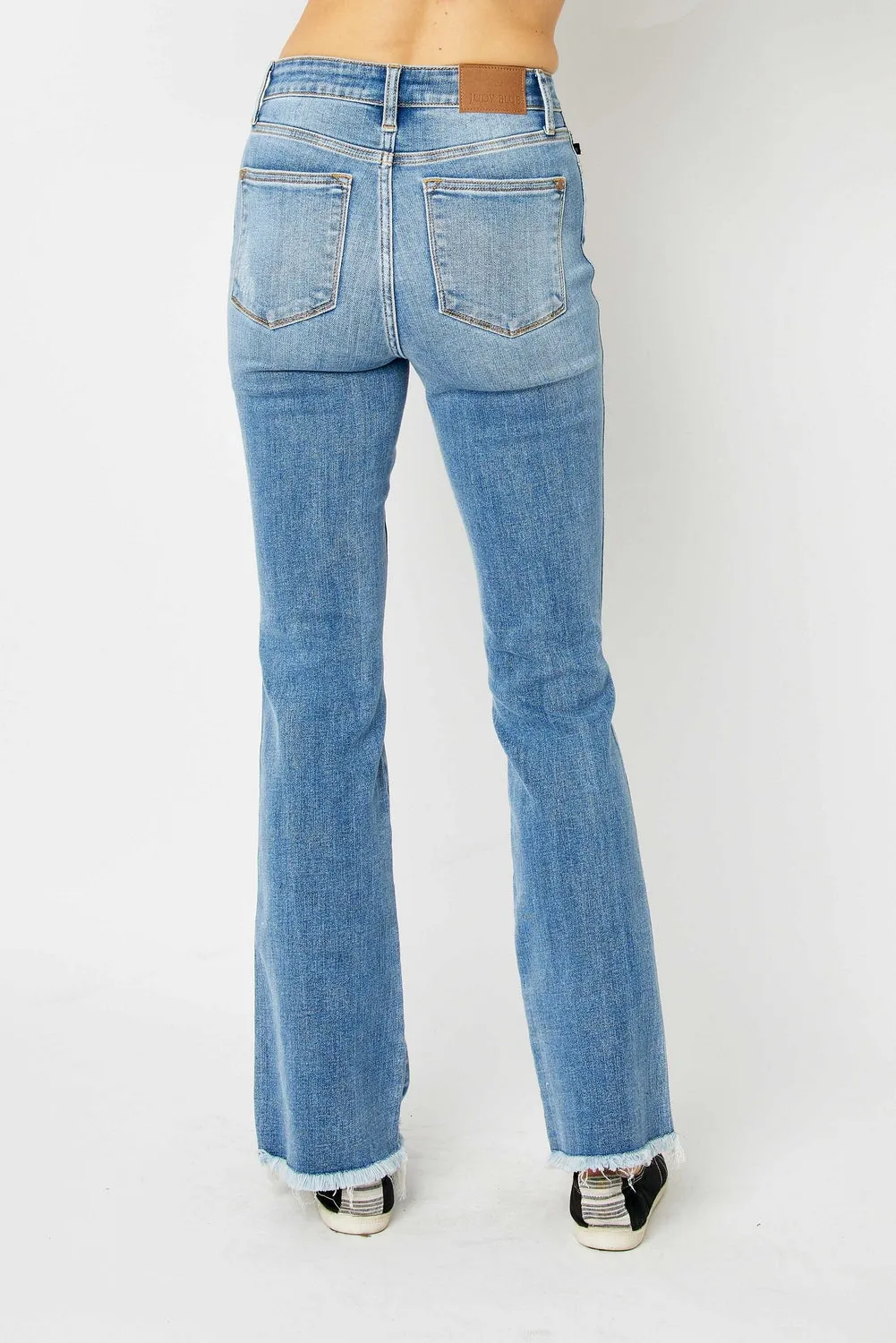 Jessica High Rise Ripped Hem Bootcut Jeans